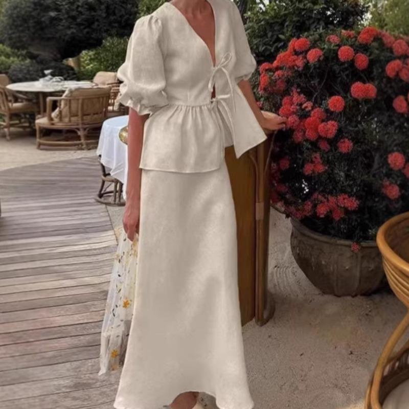European and American women's clothing spring and summer new fashion bubble sleeves V-neck lace-up top high waist skirt women's cover