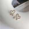 S925 Silver Needle Korean Temperament Irregular Hollow Love Pearl Earrings Small Versatile Love Stud Earrings Women