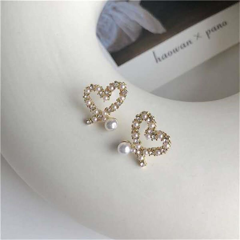 S925 Silver Needle Korean Temperament Irregular Hollow Love Pearl Earrings Small Versatile Love Stud Earrings Women