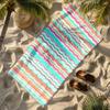 Colorful wave pattern theme polyester microfiber beach towel is highly absorbent, suitable for swimming and beach outings