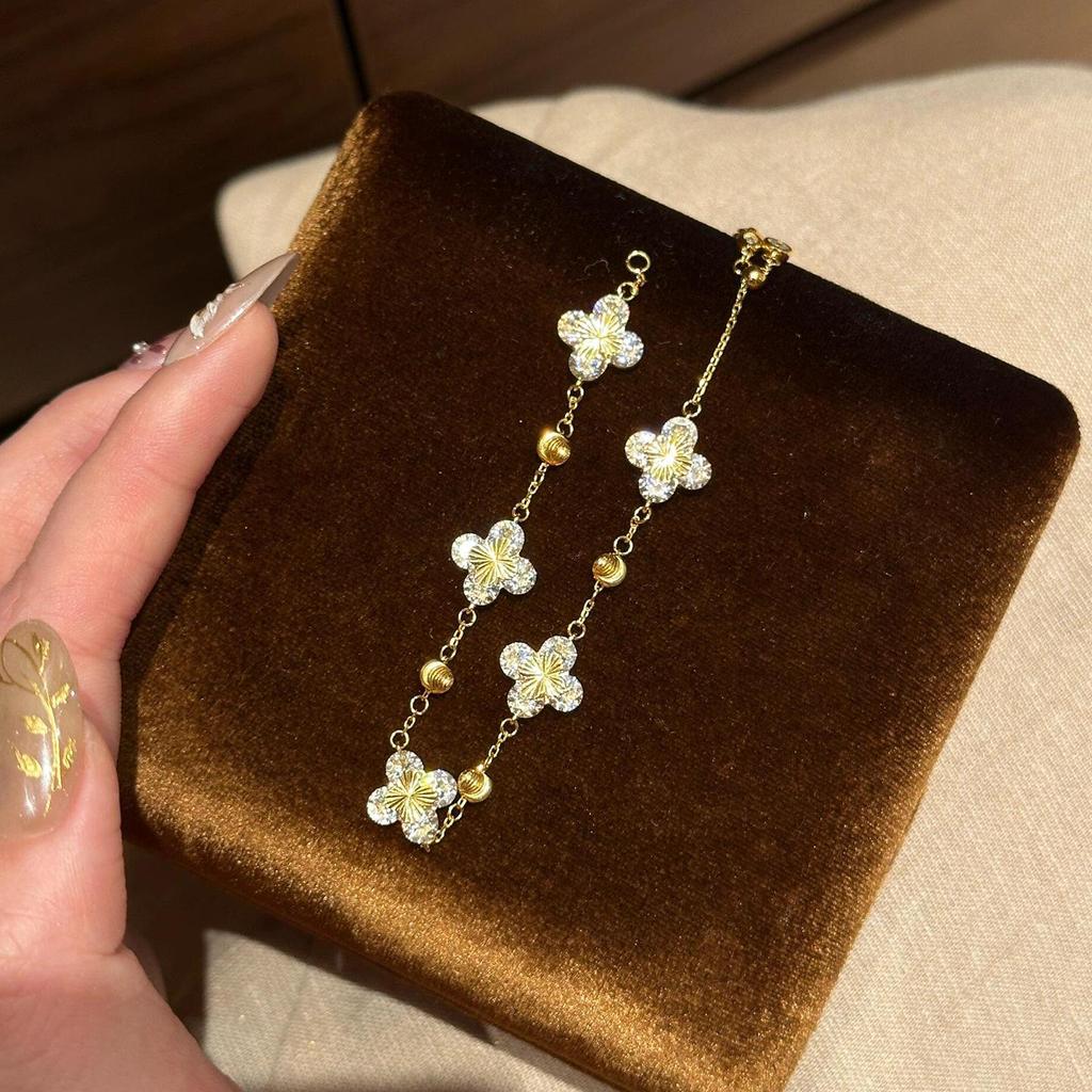 Pulsera de Trébol de Cuatro Hojas Láser Hielo Triturado Dorado Intermitente - Joyería Retro de Lujo para Mujeres