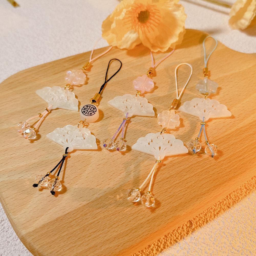 Four-Leaf Clover White Shell Fan Charm: Ancient-Style Phone Chain, Bag Pendant & Lanyard for Shoes, Clothing, and Phone Cases
