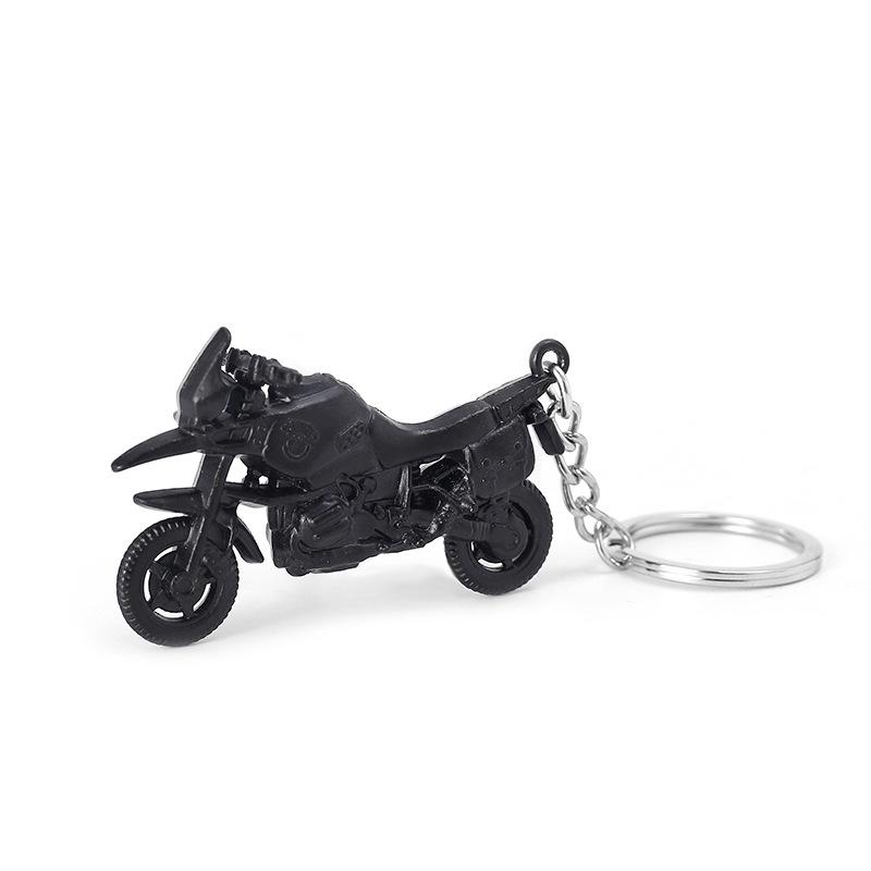 

«Хит продаж: игрушечная металлическая модель автомобиля и брелок для выживания»