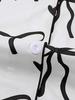 Set Pigiama con Stampa Fiocco e Revers: Completo Estivo a Maniche Corte e Pantaloncini Larghi da Donna