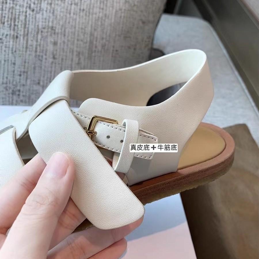 Sheepskin version~ thick-soled woven sandals women's summer one-word buckle belt hollow breathable pig cage shoes flat Roman shoes