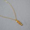 Timeless European & American Retro Gold-Plated Fishbone Pendant Necklace for Women