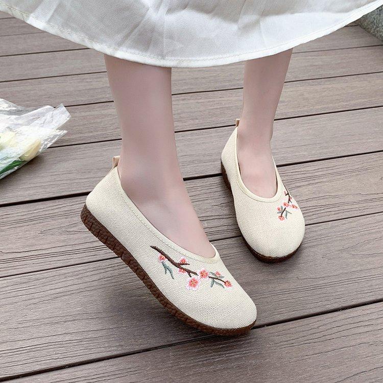 Fashion Leisure women's shoes, pullover, knitted single flat shoes, breathable round toe women's fashionable pruning plum blossom shoes