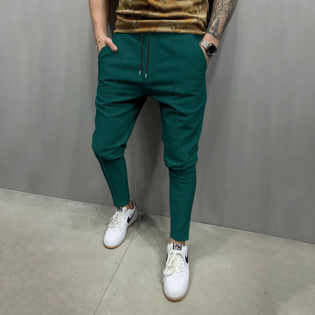 Four Seasons Men's New Solid Color Tethered Trousers Loose Casual Sports Elastic Waist Straight Pants