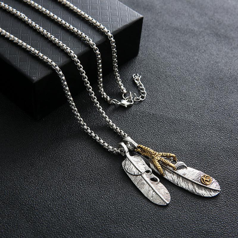 Takahashi Feather Style Necklace: European & American Hip-Hop Silver Alloy Pendant.