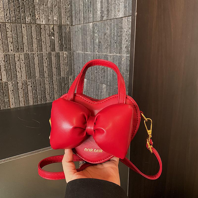 Fashion Solid PU Sweet Bowknot Handbag Cute Heart Shape Bow Mini Crossbody Bag Hot Sale Personality Shoulder Bag for Women Girls