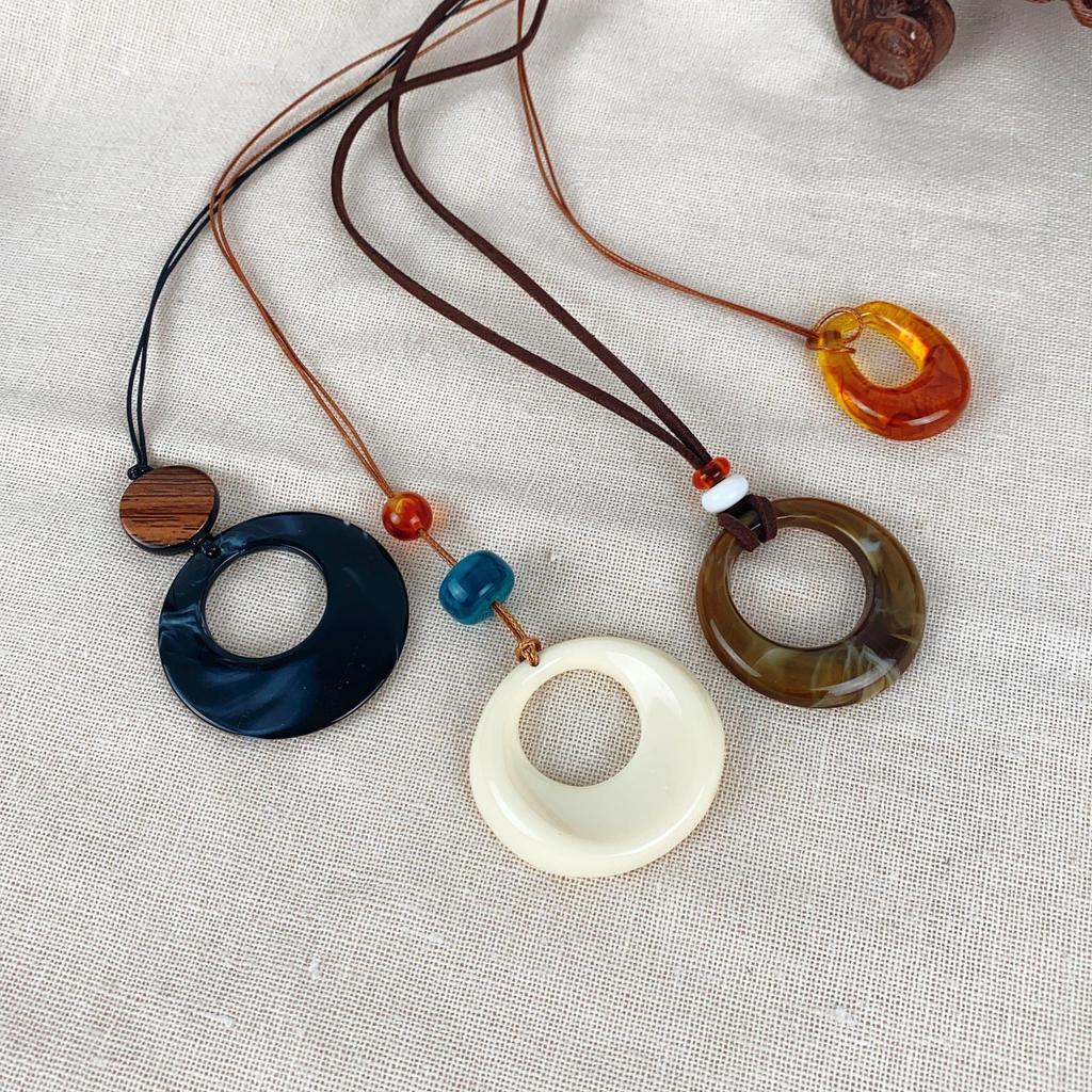 "Ethnic-Style Black Rope Ring Pendant Necklace - New Chinese Design for Autumn & Winter"