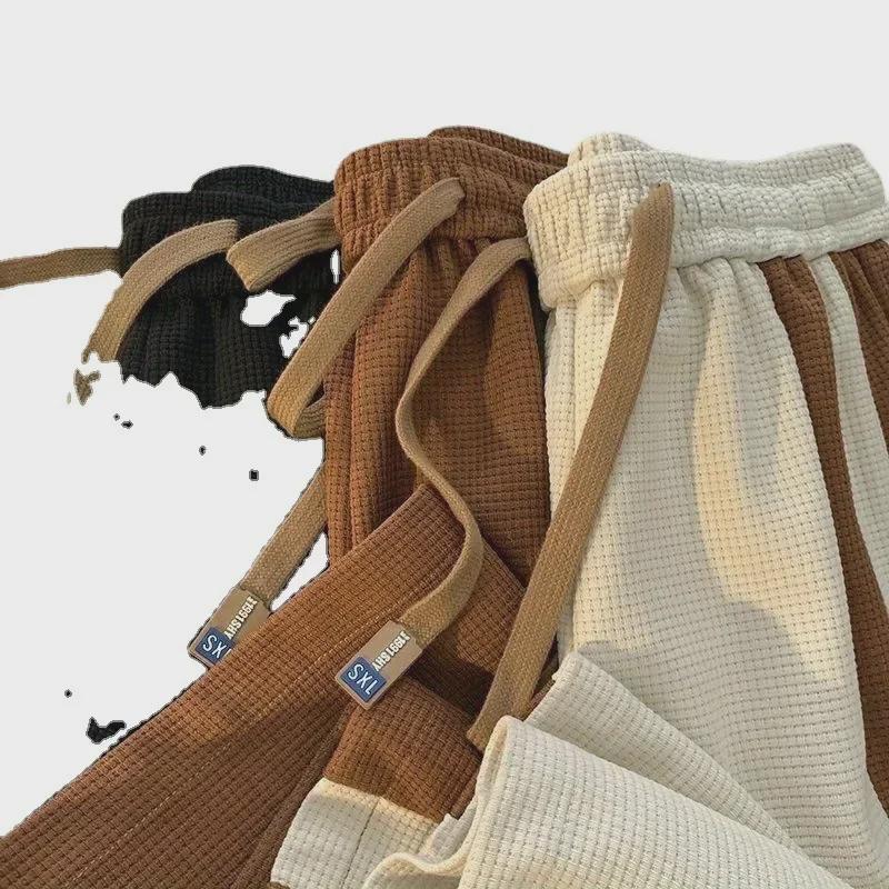 Herren-Sport-Jogginghose im amerikanischen Stil mit lockerer Passform und Kontrastnähten und weitem Bein für Frühling/Sommer