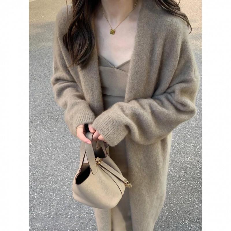 Autumn and winter medium and long sweater jacket loose lazy style design sense casual temperament niche knitted cardigan women