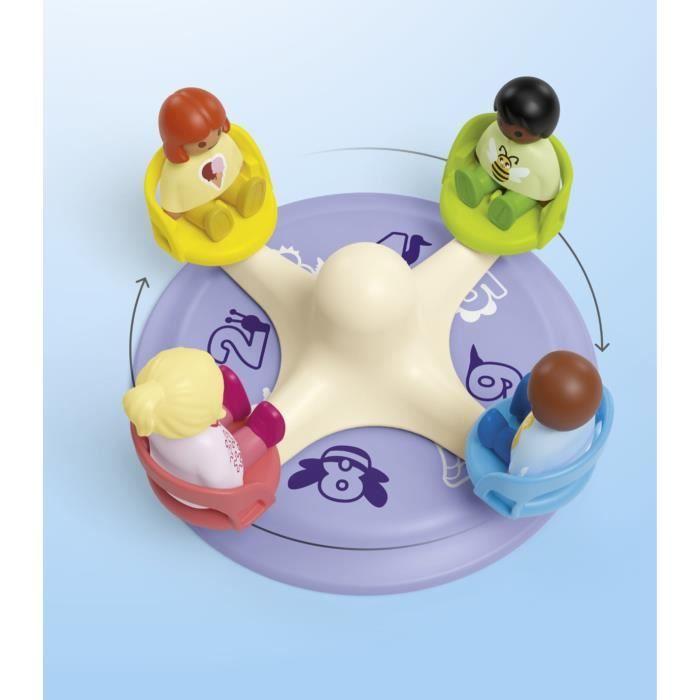 PLAYMOBIL Junior 71701 Enfants et tourniquet, Comprend quatre personnages et un tourniquet, Dès 1 an