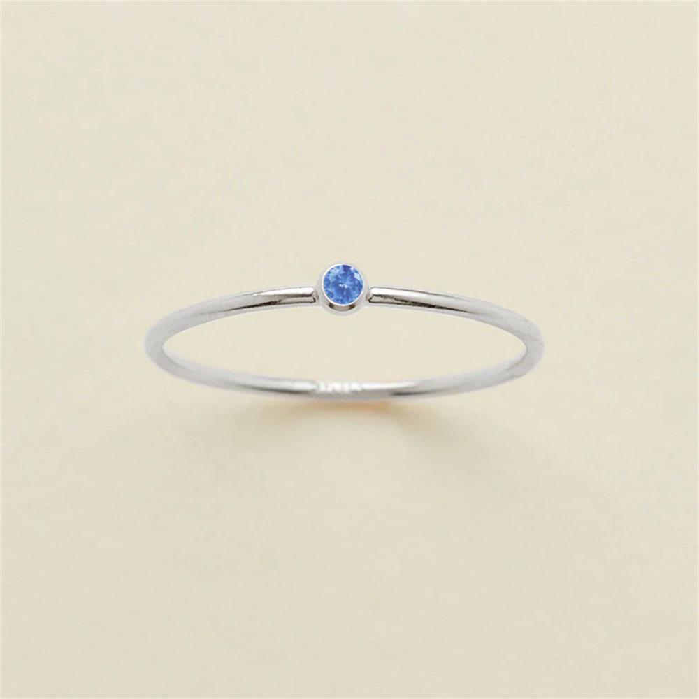 eManco Gold-Plated Non-Constricting Ring for Women - Thin Band with Tiny Diamond Accents and December Birthstone