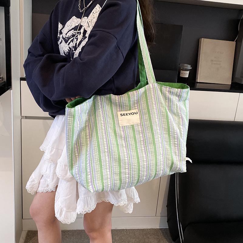 

Холщовая сумка большой вместимости женская весна-лето универсальная 2025 новая повседневная сумка на плечо литературная полосатая классная сумка-тоут зелёный