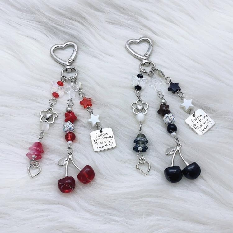 Modern Cherry Themed Keychain Accessory Crafted From Sturdy Materials Perfect For Adding Flair To Any Ensembles