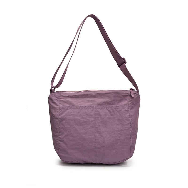 Japanese solid color nylon shoulder bag 2026 new simple and fashionable shoulder bag casual student large-capacity messenger bag