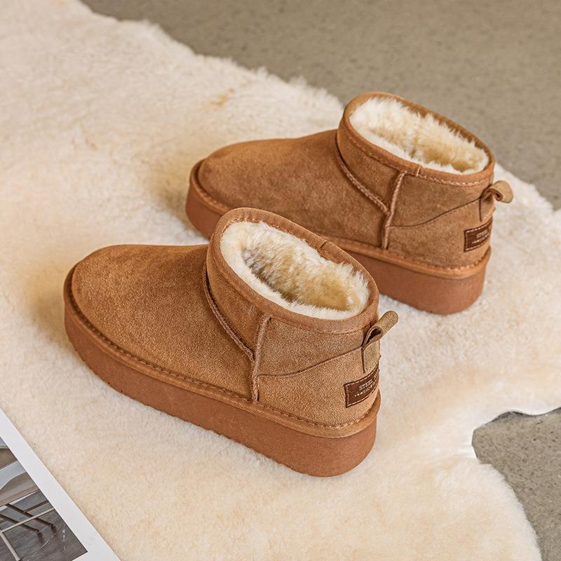 Leather snow boots winter new winter rain fur integrated thick-soled short boots piled and thickened warm women's shoes