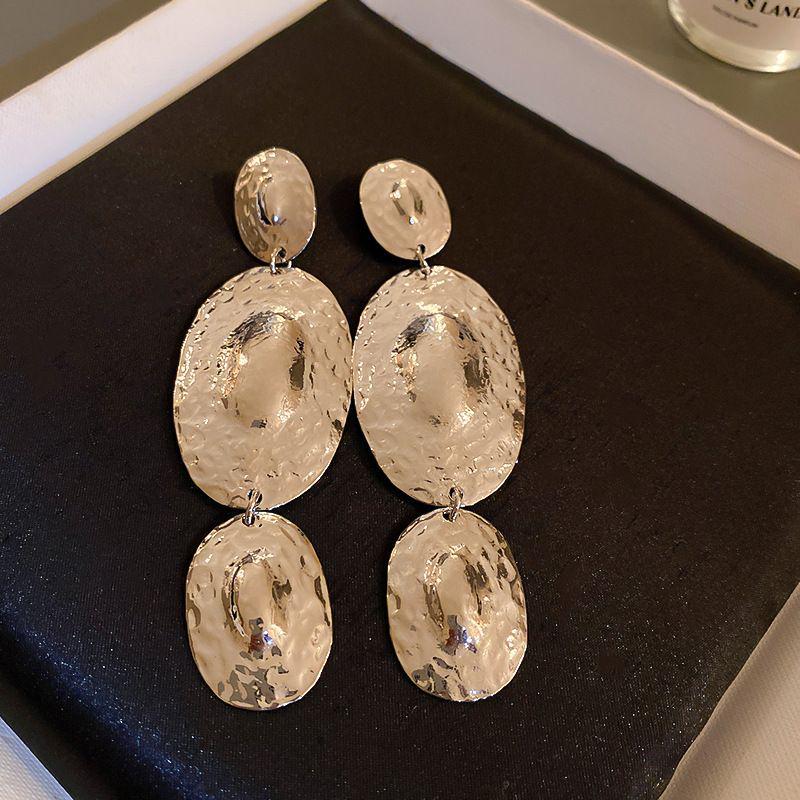 Geometric Oval Tassel Earrings: Bold European-American Style, Unique Long Metallic Design for Women