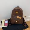 Leopard print cartoon cat backpack bag female niche design retro schoolbag versatile portable backpack