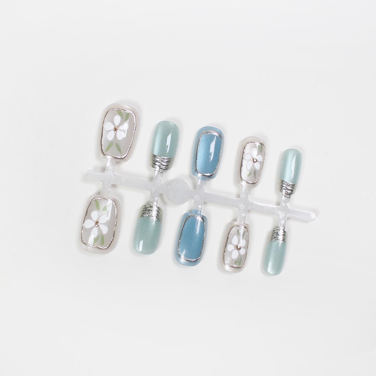 

Jiaolong Gold-Plated Color-Changing Cat Eye Nail Art Stickers - White Flower & Sheer Blue Design XS