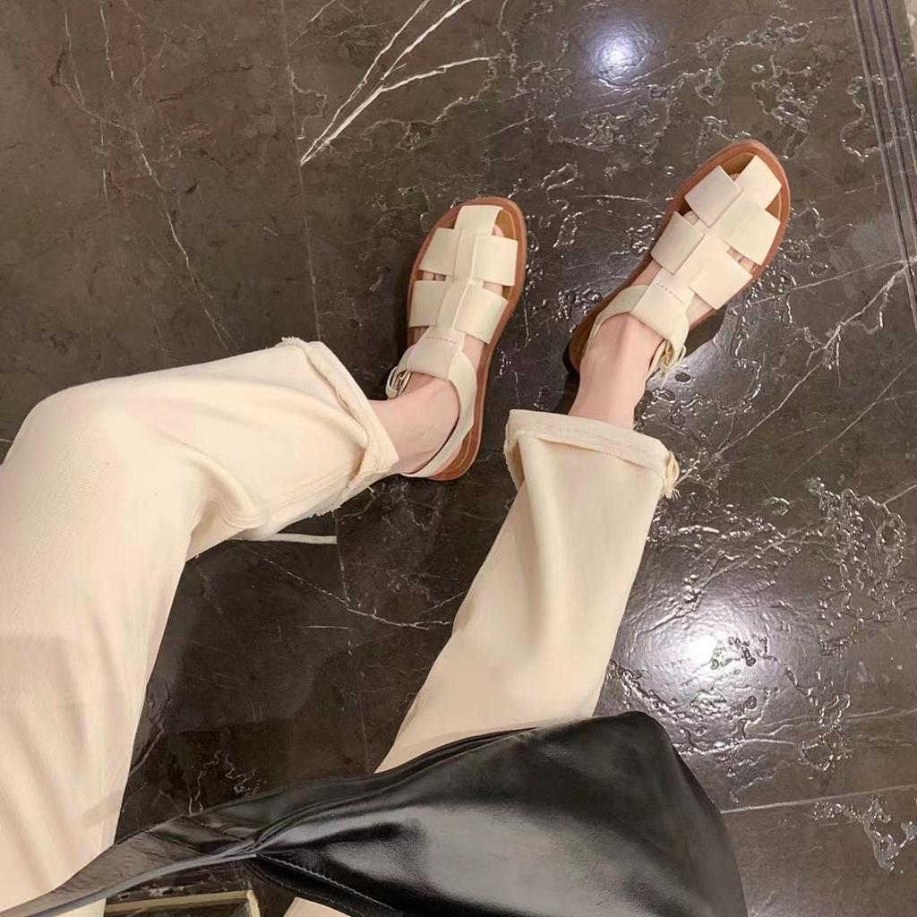 Sheepskin version~ thick-soled woven sandals women's summer one-word buckle belt hollow breathable pig cage shoes flat Roman shoes