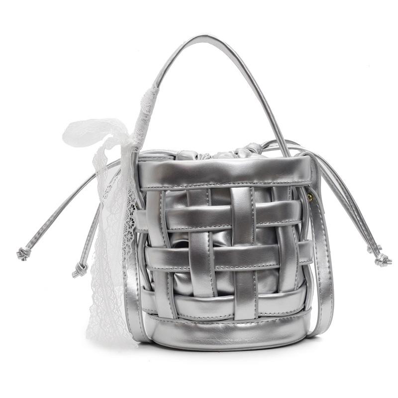

Creative personalized woven bag mini spring and summer pumping belt cylinder hollow oblique span mini bucket women s bag one size fits all срібний