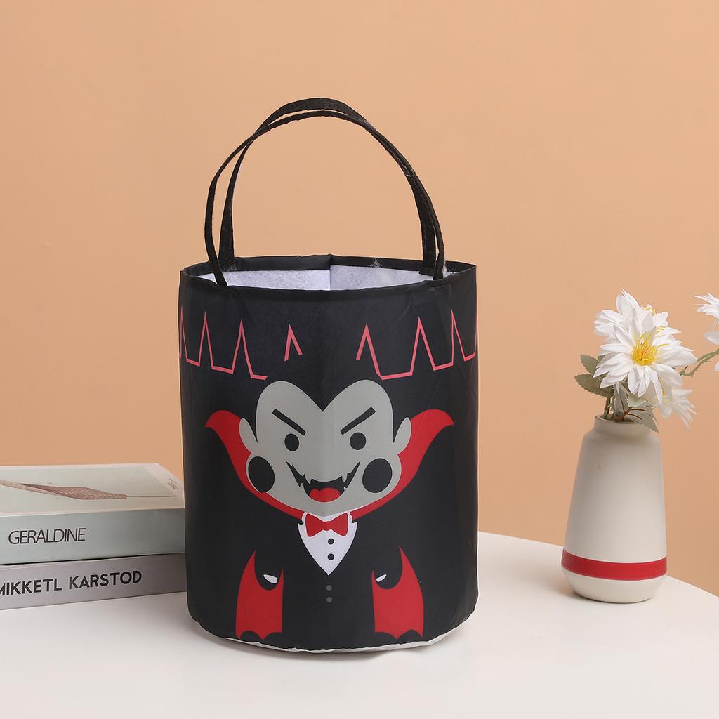 New illuminated Halloween candy bucket, three-dimensional handheld pumpkin bucket, witch and vampire-themed festive atmosphere