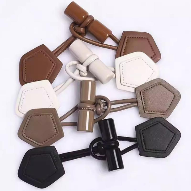 1 Set Hornleder Harz Seil Schnalle DIY Nähzubehör Schwarzer Mantel Wollknopf Pullover Kinder-Hornschließe Großhandel