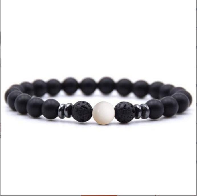 

Женский энергетический браслет для йоги из матового вулканического камня 8 мм и янтаря
