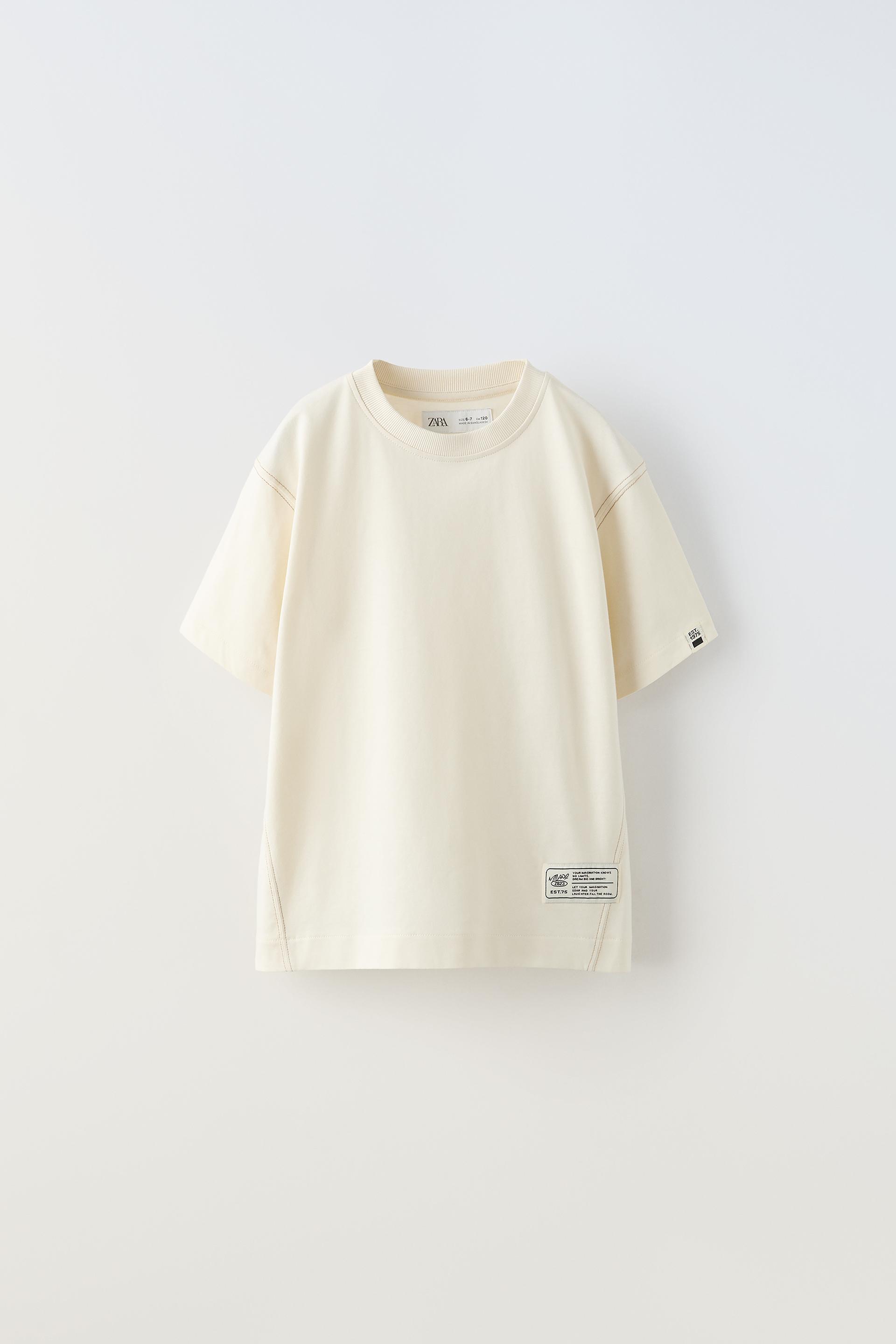 

ФЛОКИРОВАННАЯ ЧАШКА (С) ФУТБОЛКА