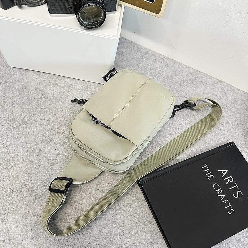

Sports travel breast bag men s and women s tide brand outdoor running shoulder small backpack canvas ultra-light girls messenger bag summer серый