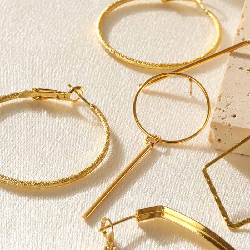 Einfache und kalte Ohrstecker im Retro-Wellen-Stil, Nischendesign, lange Quasten-Kupferohrringe