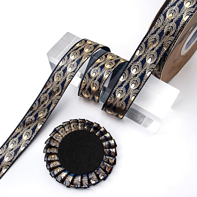 10 meter/rull påfuglfjærtrykt bånd Webbing silkebånd fjær gullbelagt bånd laserbånd 2,5x914cm