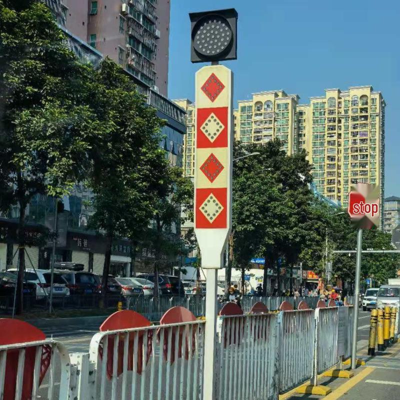 Solar-Powered Pedestrian Priority Railway Crossing Signal with Flashing Yellow Light and Reflective Signage.
