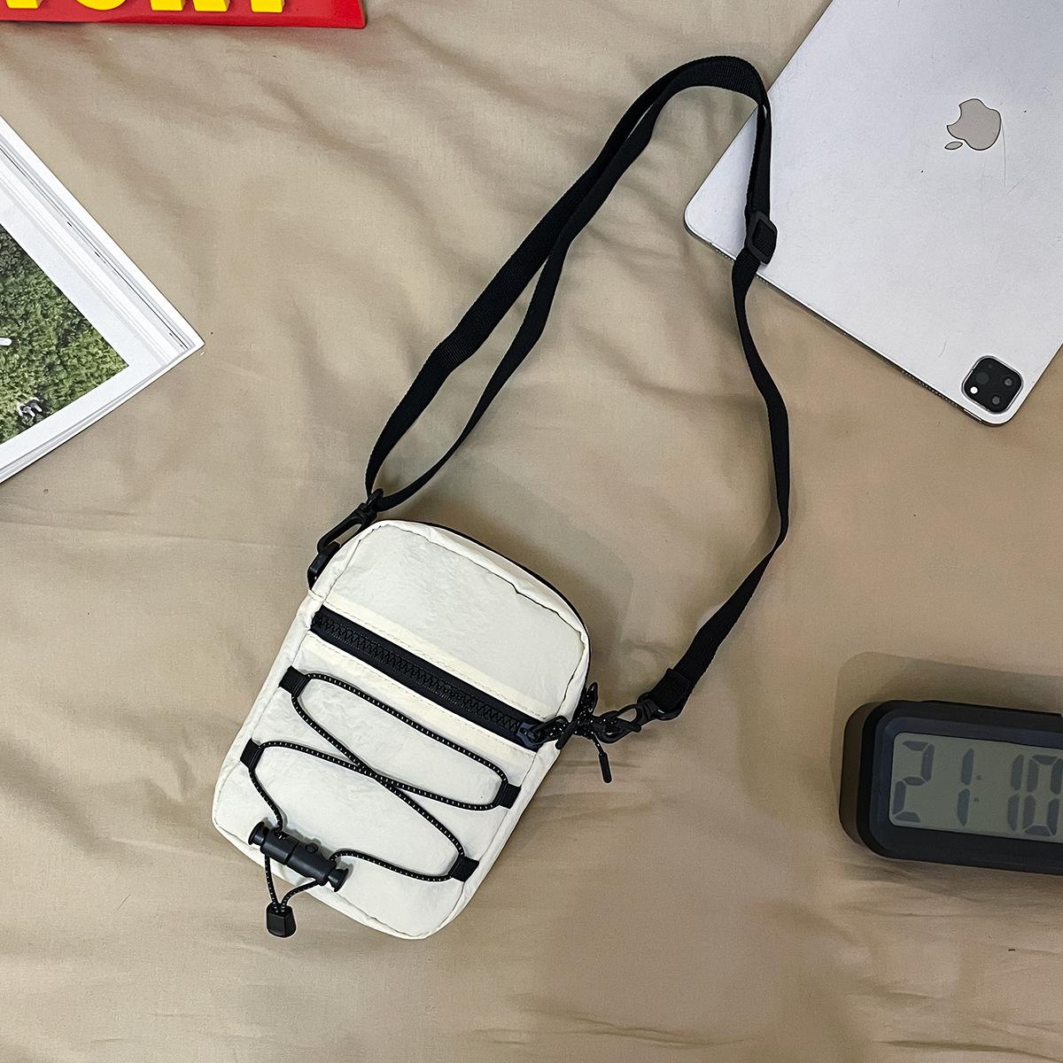 

Korean Hong Kong style retro trendy cool messenger bag summer new drawstring student messenger bag Japanese Harajuku small bag белый