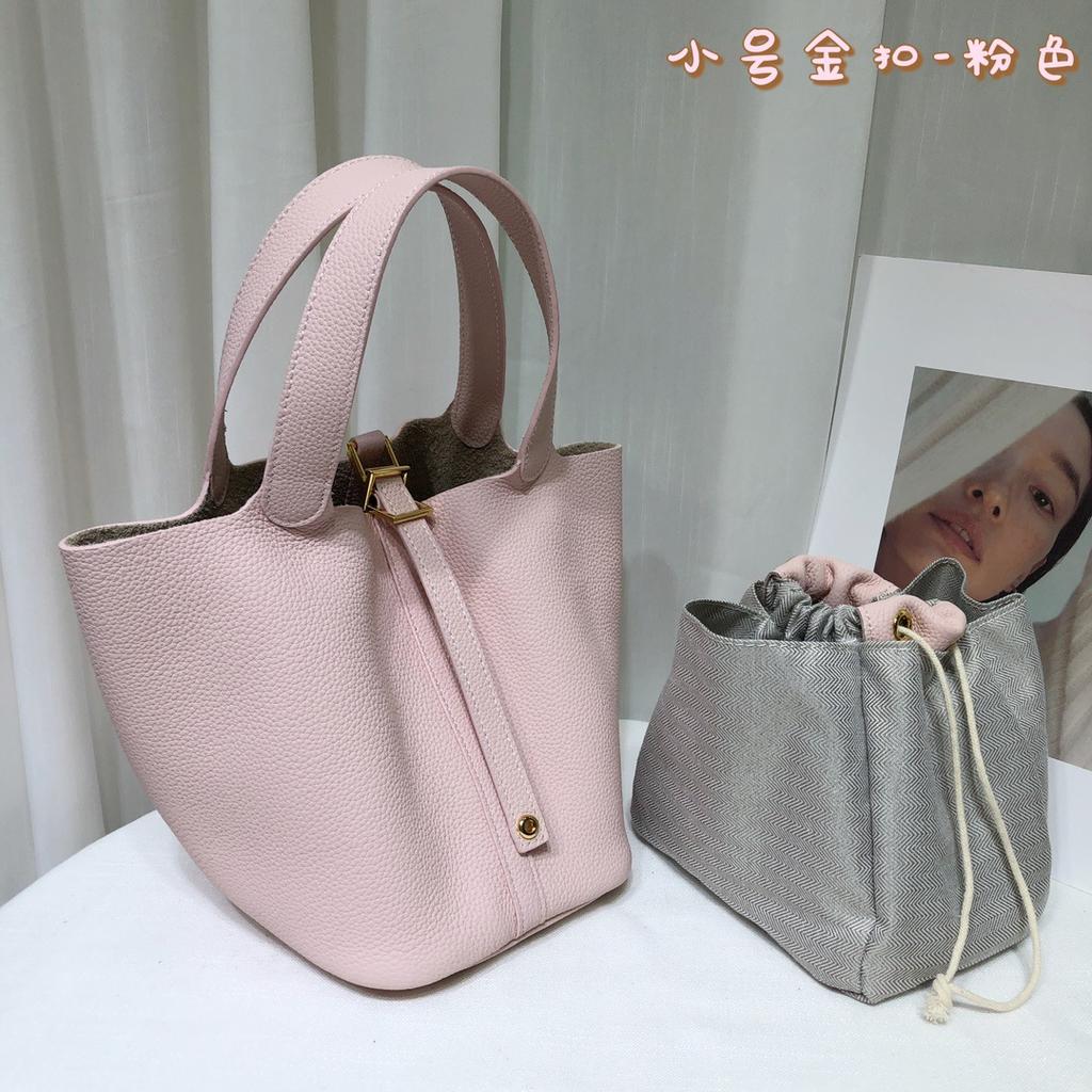 Spot wholesale top layer cowhide vegetable basket bag leather bucket bag commuter fashion lock buckle hand-held handbag woman