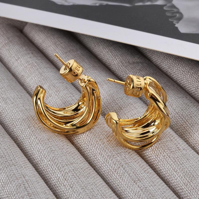 

Niche personality irregular winding lines metal wind stud earrings high sense light luxury simple fashion earrings earrings women