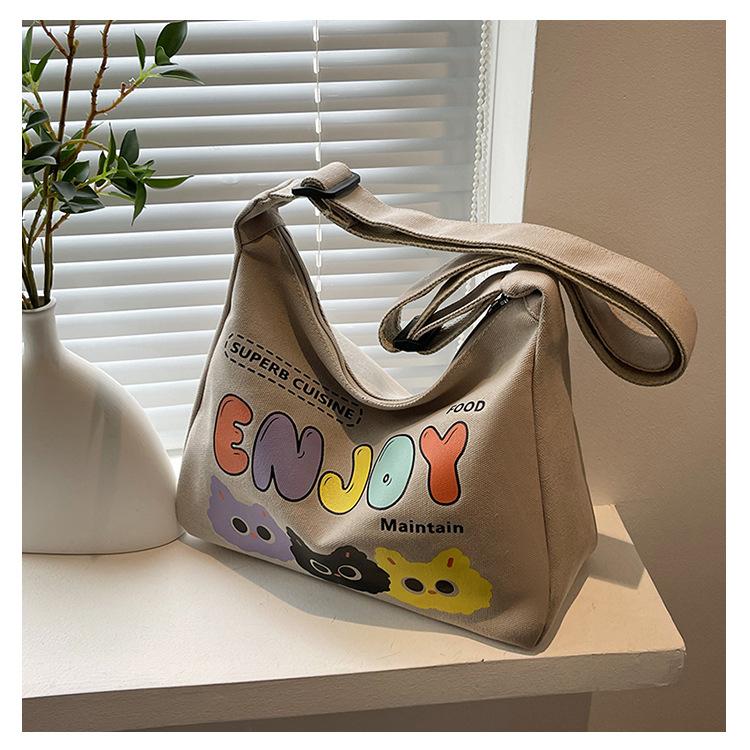 Canvas Bag Women's Large-capacity Bag New Fashion Cartoon Letter Casual Shoulder Messenger Bag