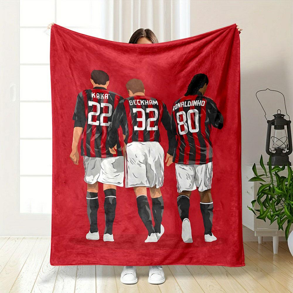 Three soccer players in red and black striped jerseys with white shorts. for all seasons blanket lunch break throw gift