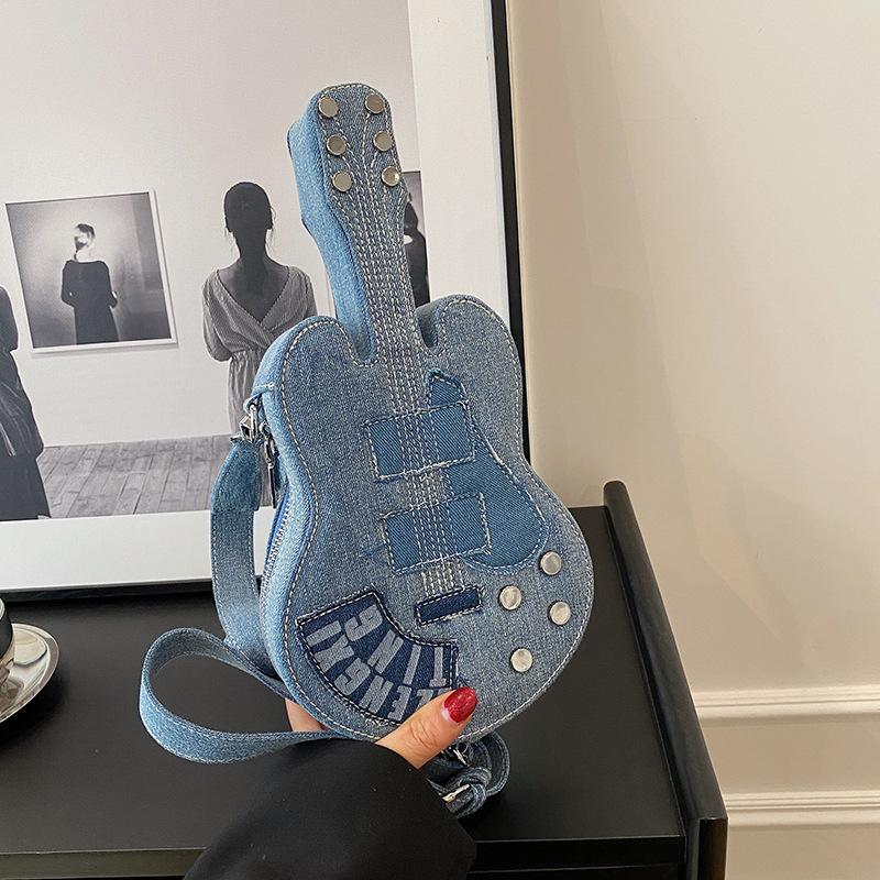 

Versatile messenger new Spice Girl unique niche design sense women s retro shoulder bag guitar shape denim bag синій