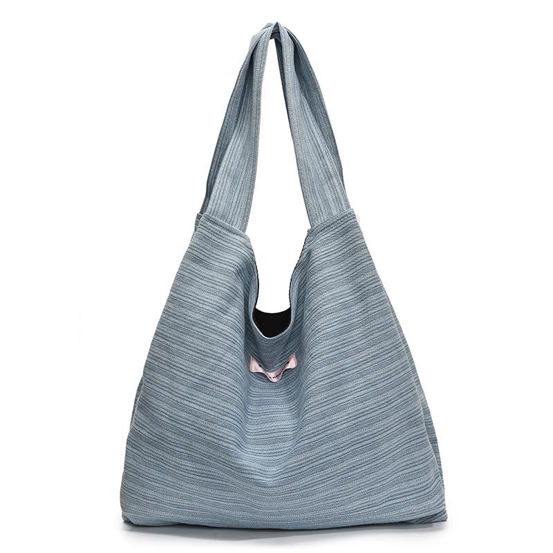 

New niche casual lazy wind tote bag light large capacity versatile shoulder women s bag світло-синій колір