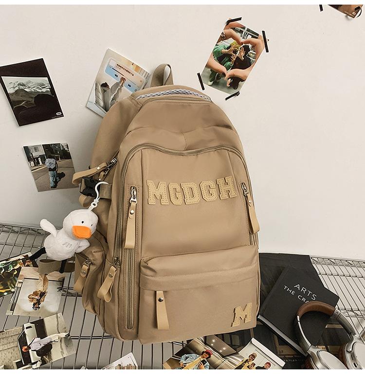 Schoolbag trendy cool fashion versatile backpack junior high school student schoolbag simple large capacity letter casual couple backpack
