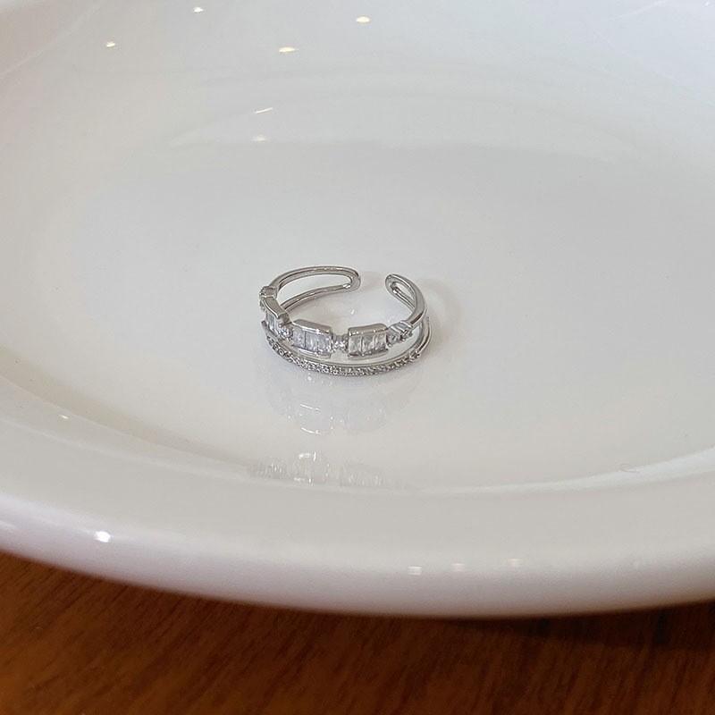 

Dazzling Gold White Plated Open Ring For Women Featuring Intricate Hollow Design And Fit Adjustable