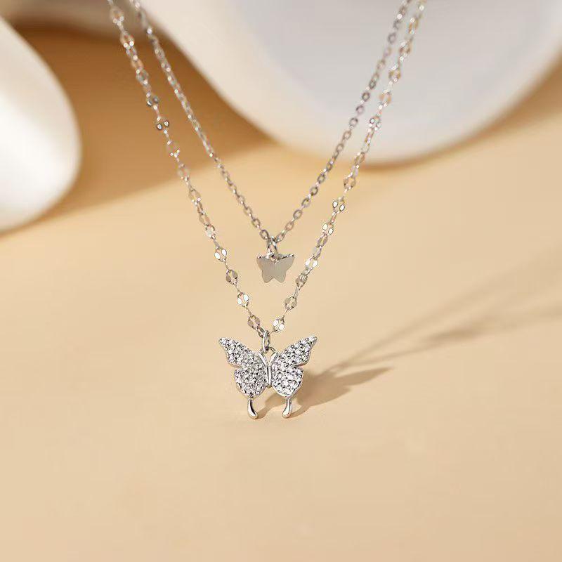 Butterfly Double-Layer Diamond Inlaid Necklace - High-End Cool Style, Shiny, Simple, Versatile Accessory for Women.