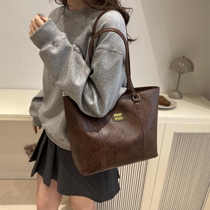 High-End Damen Tasche mit großer Kapazität Neuer Stil Einfache Pendler-Schultertasche Modische und vielseitige Unterarm-Tragetasche