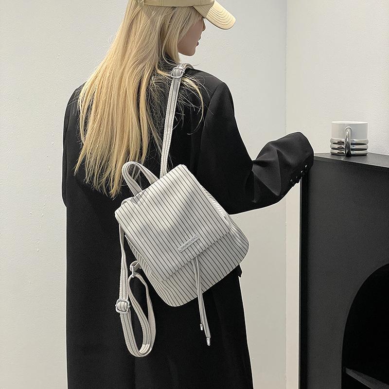 

Niche backpack versatile premium bag striped mini drawstring backpack