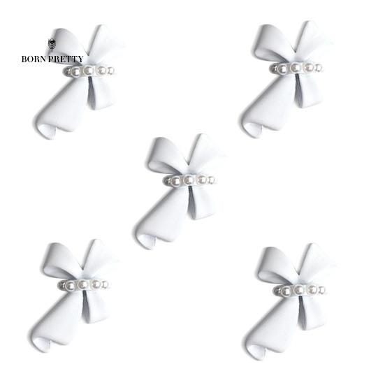 

Изысканные украшения для ногтей. Украшения для ногтей. Широкое применение. Привлекательное применение. белый