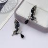 New temperament three-dimensional hollow design crystal butterfly water drop love stud earrings retro versatile high-end earrings women